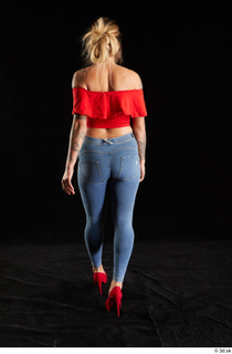 Daisy Lee 1 back view blue jeans dressed red high…